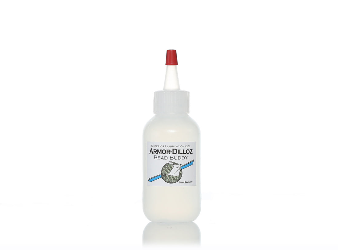 Bottle of Armor-Dilloz Bead Buddy tire lubricant.