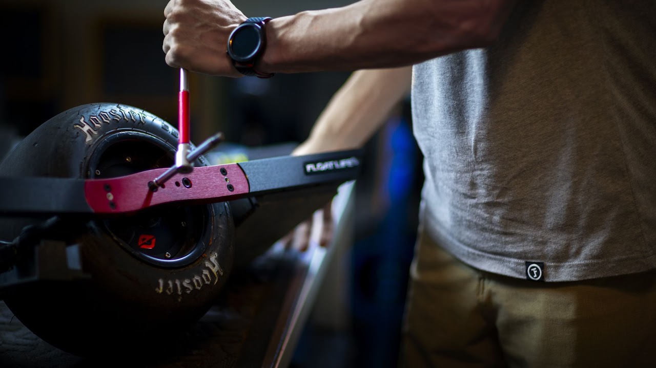A Onewheel being worked on at the service bench.